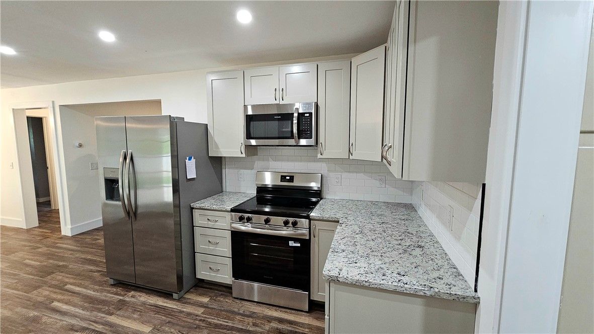 Interior, Kitchen, Recessed Lighting, Stainless Steel Appliances, Wood Texture Flooring