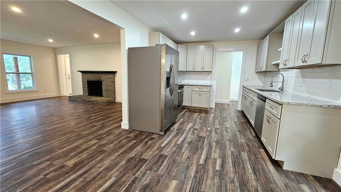 Fireplace, Interior, Kitchen, Recessed Lighting, Wood Texture Flooring