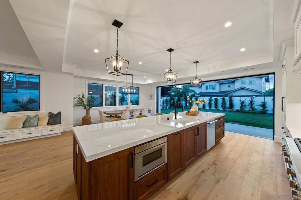 Dining room, Interior, Kitchen, Pendant Lights, Recessed Lighting, Stainless Steel Appliances, Wood Texture Flooring