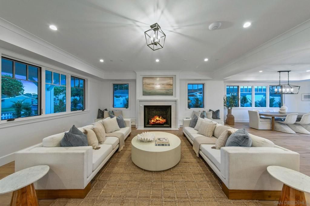 Dining room, Fireplace, Interior, Living room, Pendant Lights, Recessed Lighting, Wood Texture Flooring