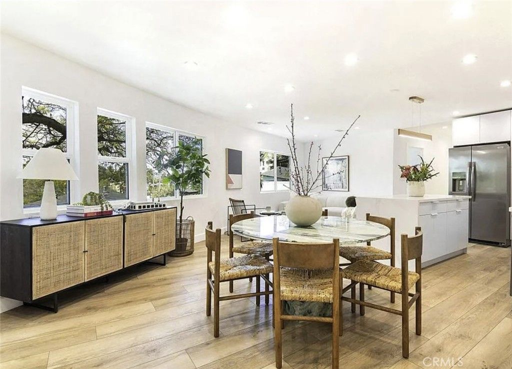 Dining room, Interior, Kitchen, Pendant Lights, Recessed Lighting, Stainless Steel Appliances, Wood Texture Flooring