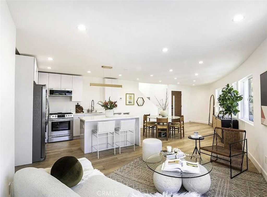 Dining room, Interior, Kitchen, Living room, Pendant Lights, Recessed Lighting, Stainless Steel Appliances, Wood Texture Flooring