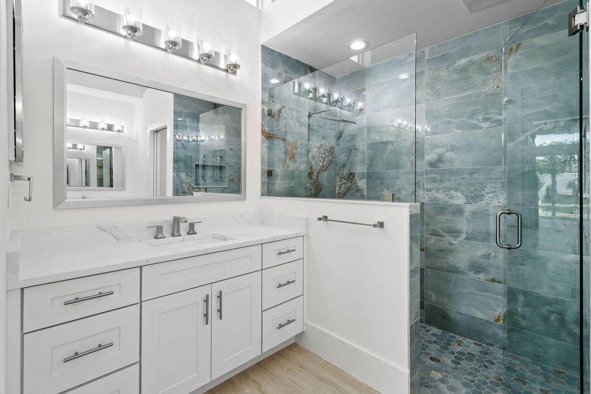 Bathroom, Dual Sink Vanities, Glass Shower, Interior, Recessed Lighting, Wood Texture Flooring
