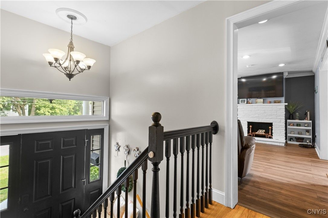 Chandelier, Fireplace, Interior, Recessed Lighting, Wood Texture Flooring