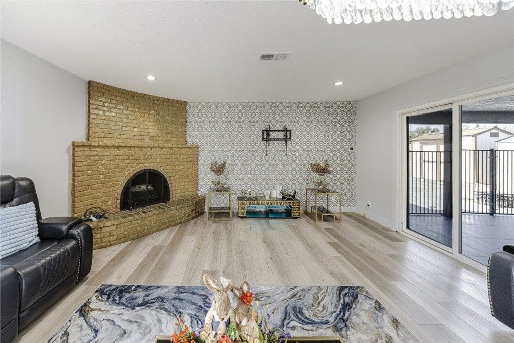 Fireplace, Interior, Recessed Lighting, Stone Walls, Wood Texture Flooring