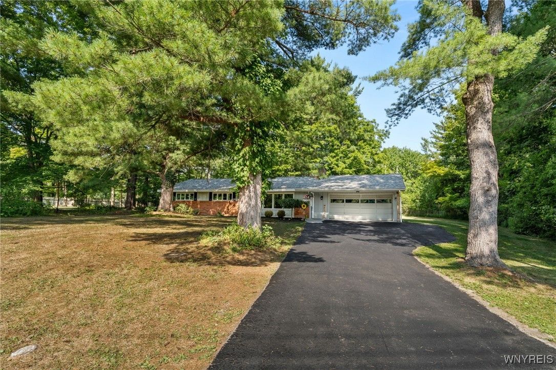 Attached, Backyard, Exterior, Facade, Brick Facade, Ranch