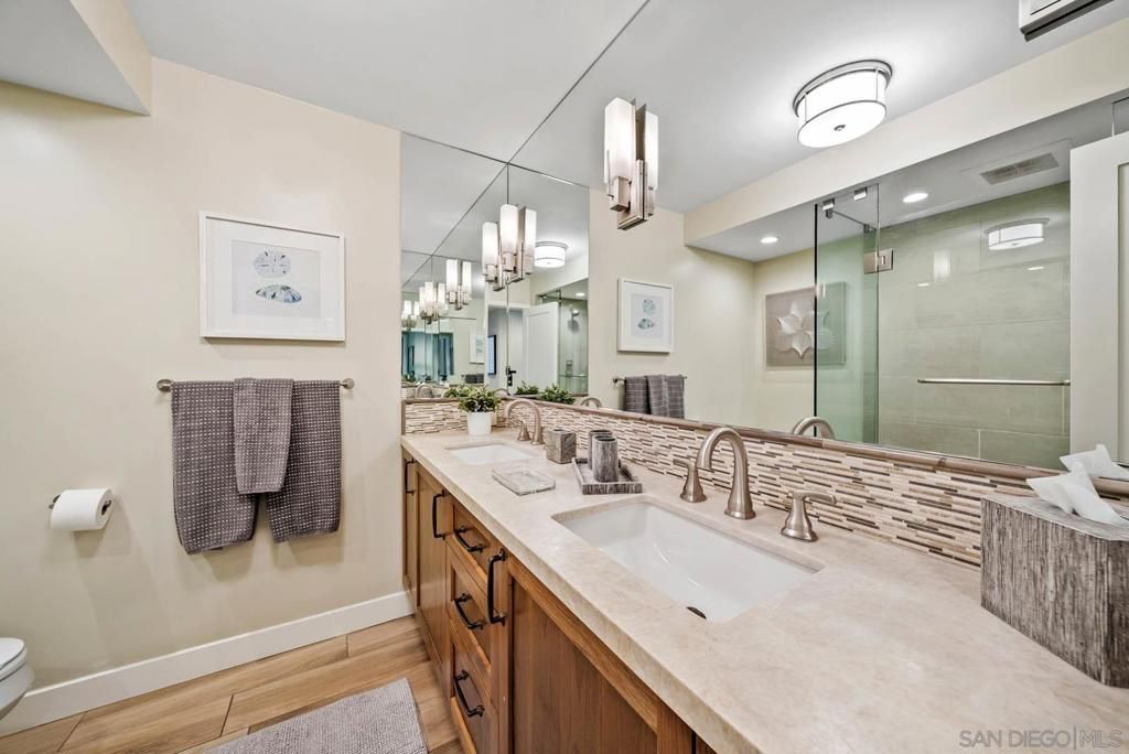 Bathroom, Dual Sink Vanities, Glass Shower, Interior, Recessed Lighting, Wood Texture Flooring