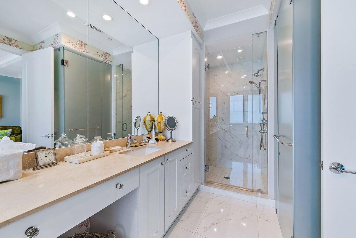 Bathroom, Dual Sink Vanities, Glass Shower, Interior, Marble, Marble Walls, Recessed Lighting