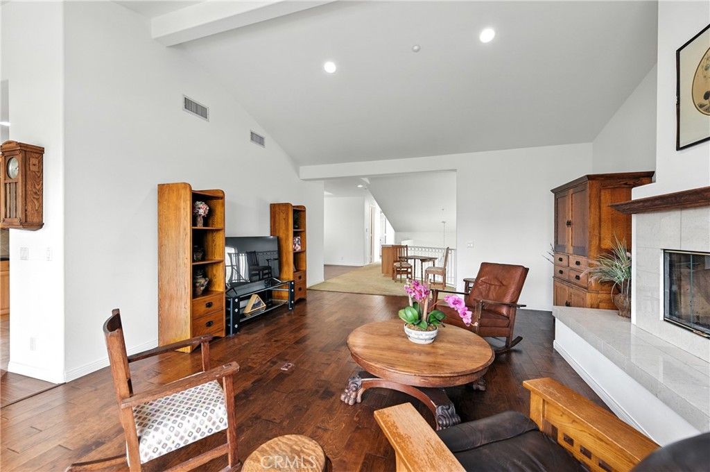 Dining room, Fireplace, Interior, Living room, Recessed Lighting, Wood Texture Flooring