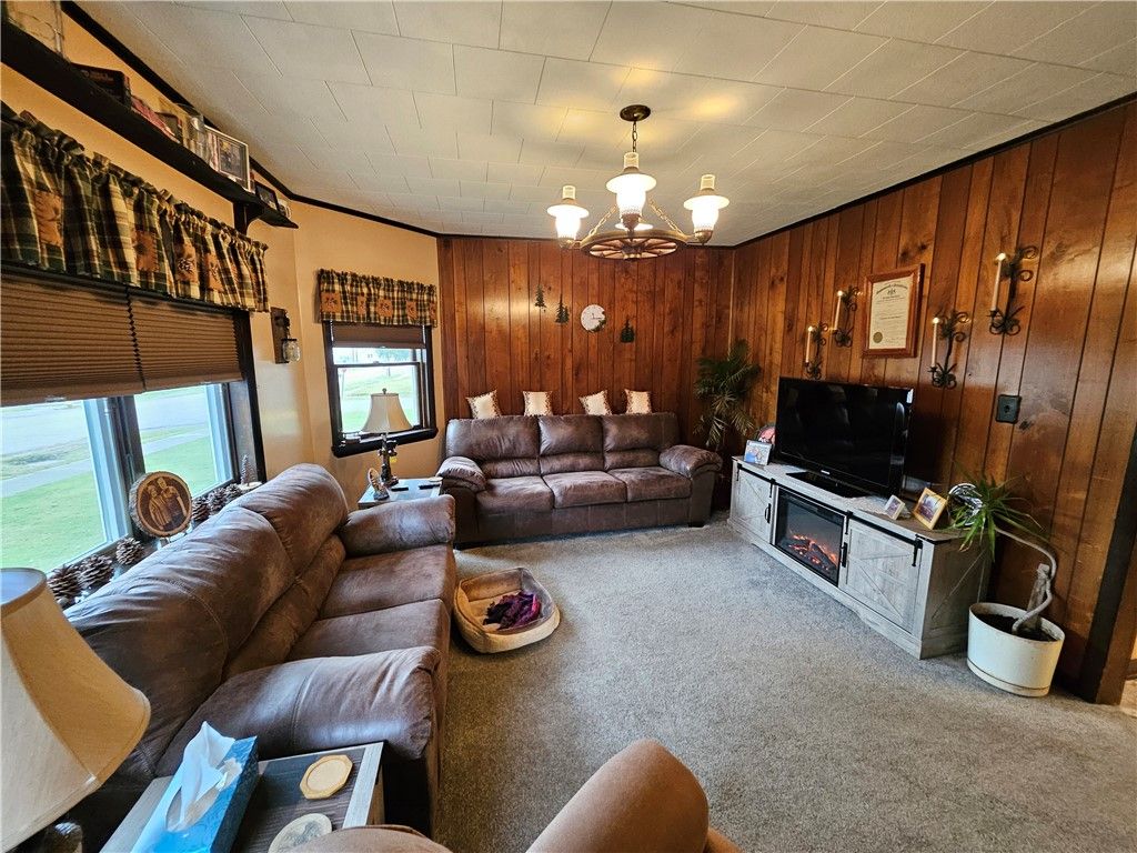 Chandelier, Fireplace, Interior, Living room, Wooden Walls