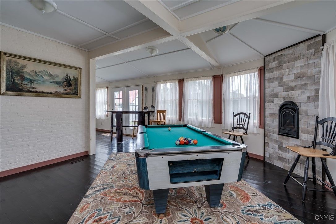 Billiard Table, Fireplace, Game Room, Interior, Stone Walls, Wood Texture Flooring