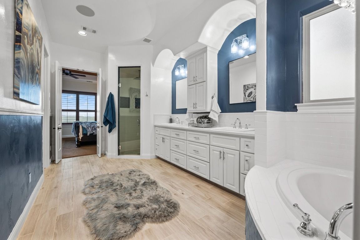 Bathroom, Dual Sink Vanities, Interior, Recessed Lighting, Wood Texture Flooring