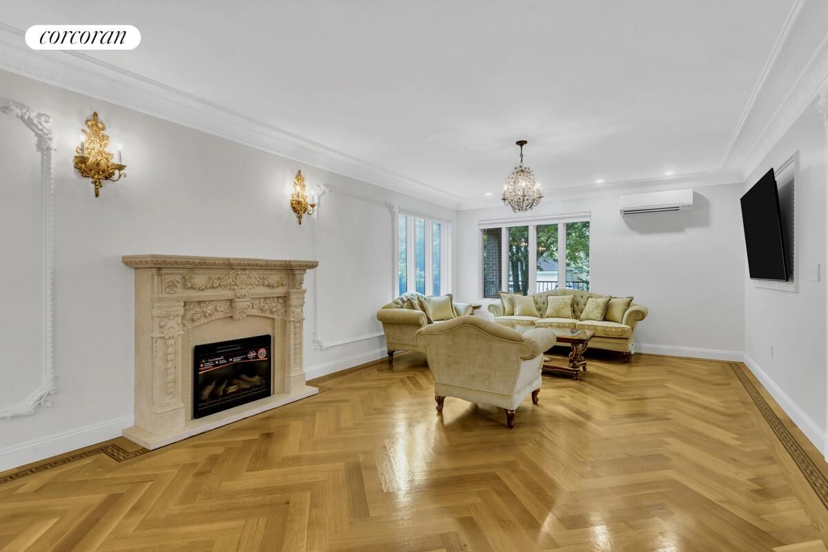 Chandelier, Fireplace, Interior, Living room, Recessed Lighting, Wood Texture Flooring