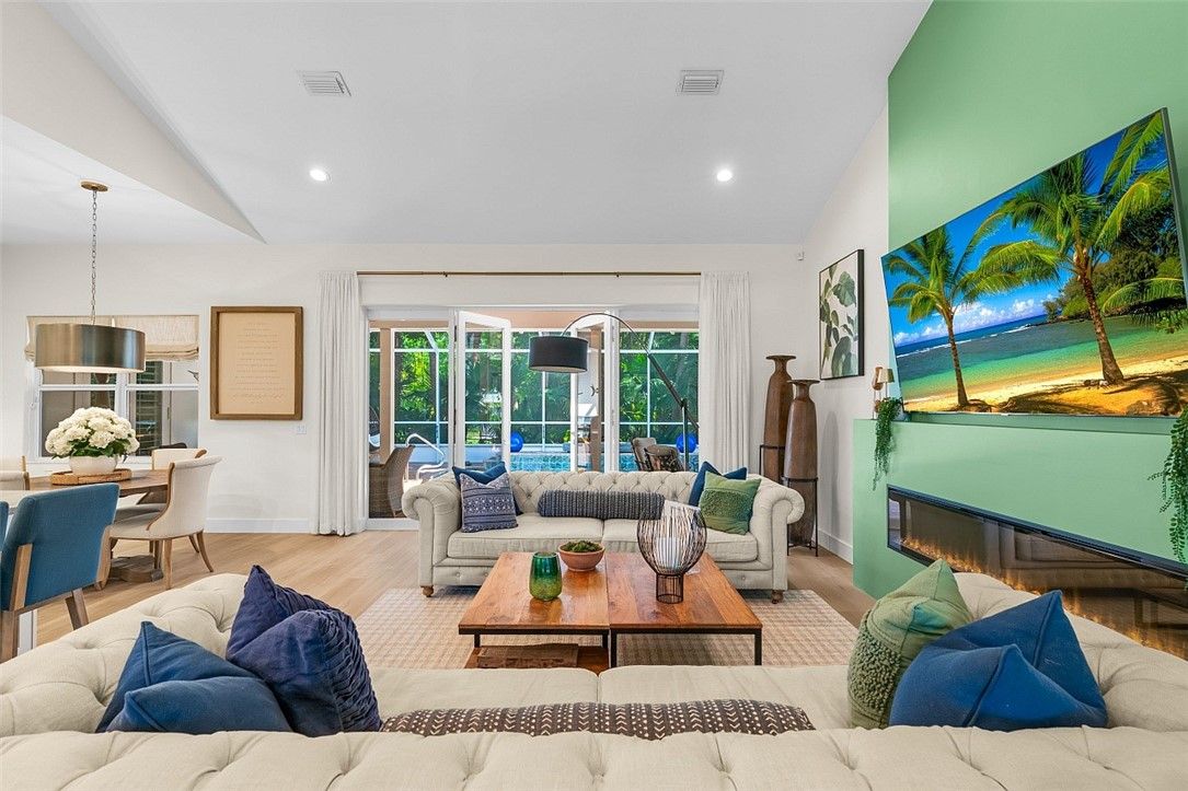 Dining room, Fireplace, Interior, Living room, Pendant Lights, Recessed Lighting, Wood Texture Flooring