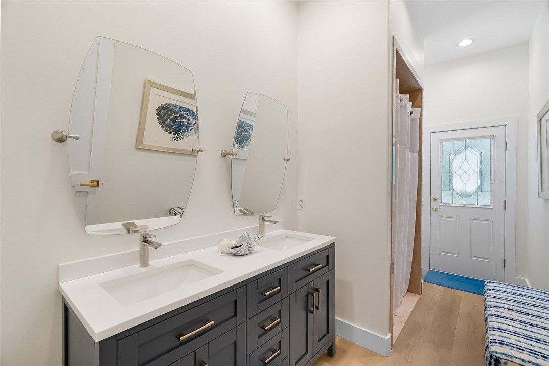 Bathroom, Dual Sink Vanities, Interior, Recessed Lighting, Wood Texture Flooring