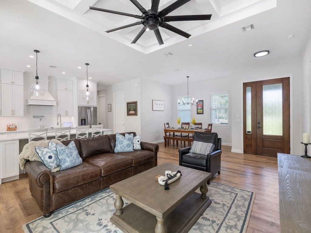 Dining room, Interior, Kitchen, Living room, Pendant Lights, Recessed Lighting, Stainless Steel Appliances, Wood Texture Flooring