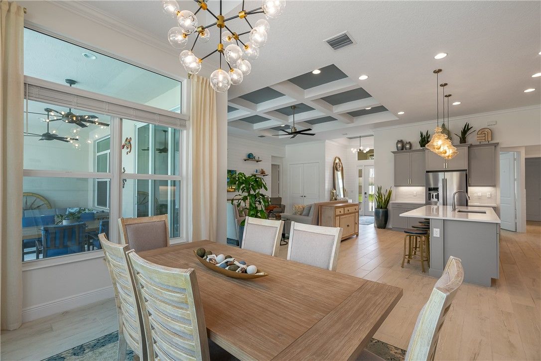 Dining room, Interior, Kitchen, Pendant Lights, Recessed Lighting, Stainless Steel Appliances, Wood Texture Flooring