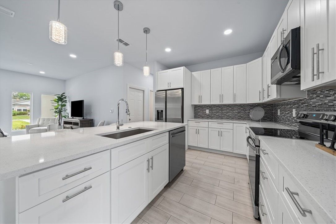 Interior, Kitchen, Pendant Lights, Recessed Lighting, Stainless Steel Appliances, Wood Texture Flooring