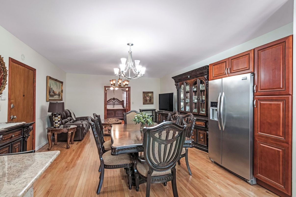 Chandelier, Dining room, Interior, Kitchen, Stainless Steel Appliances, Wood Texture Flooring
