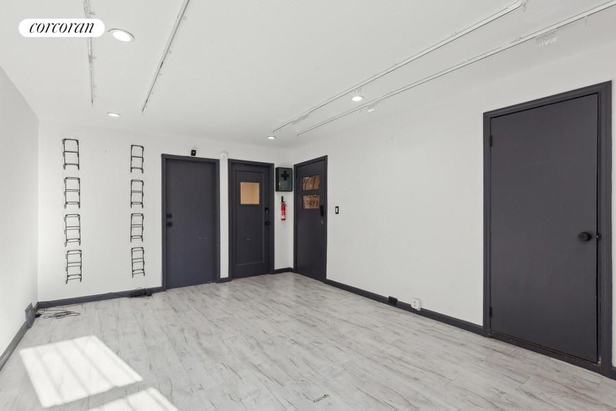 Elevator, Empty room, Interior, Recessed Lighting, Wood Texture Flooring