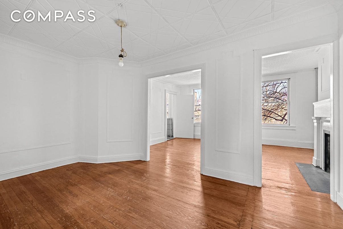 Empty room, Fireplace, Interior, Pendant Lights, Wood Texture Flooring