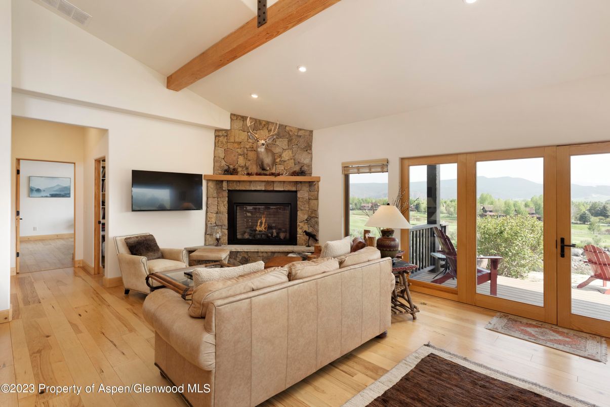 Fireplace, Interior, Living room, Recessed Lighting, Stone Walls, Wooden Beams, Wood Texture Flooring