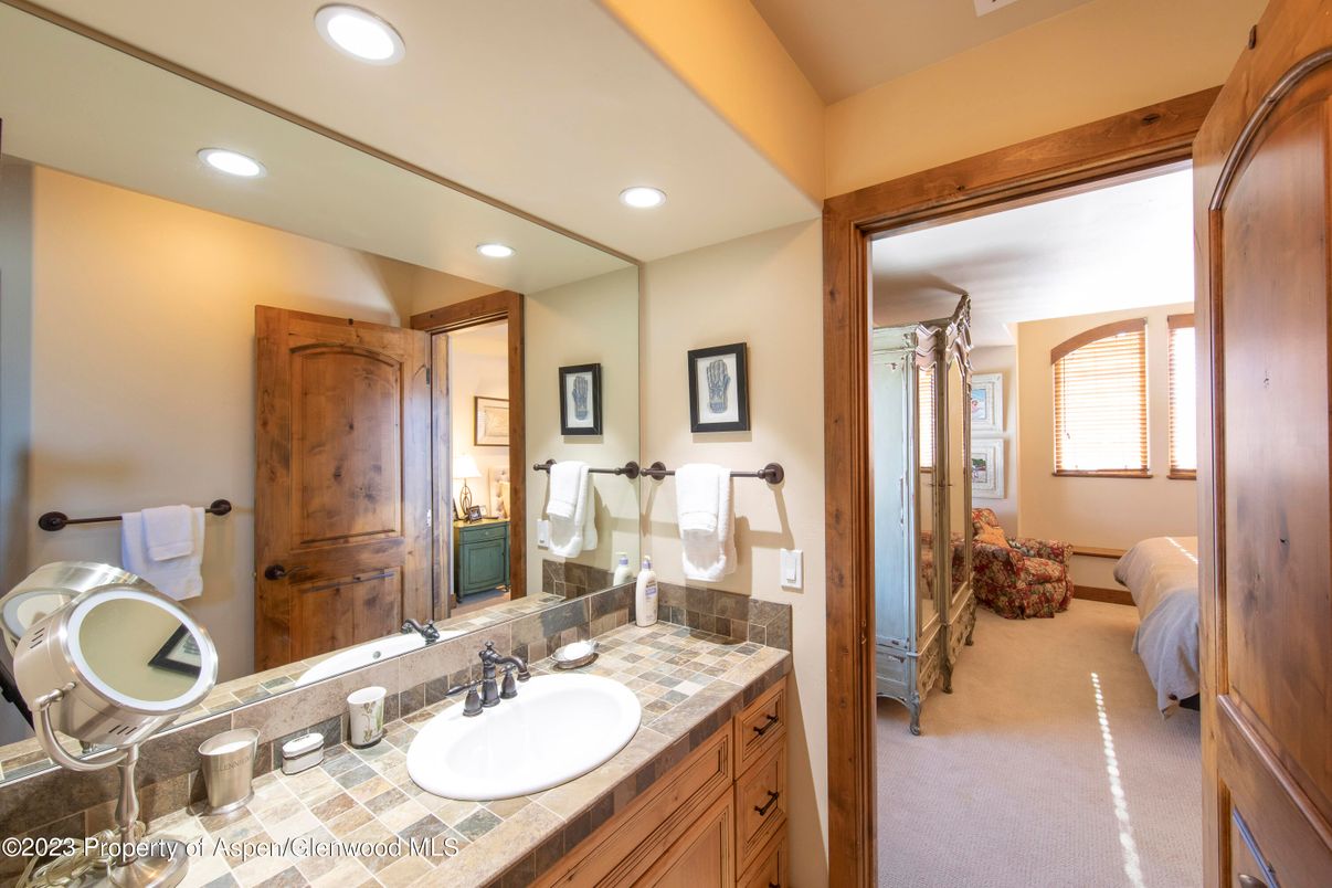 Bathroom, Dual Sink Vanities, Interior, Recessed Lighting, Tile Countertops