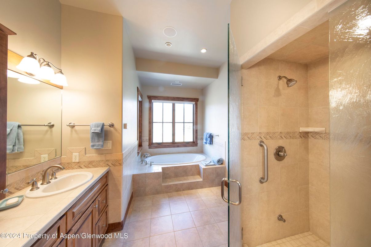 Bathroom, Dual Sink Vanities, Glass Shower, Interior, Recessed Lighting, Tile Countertops