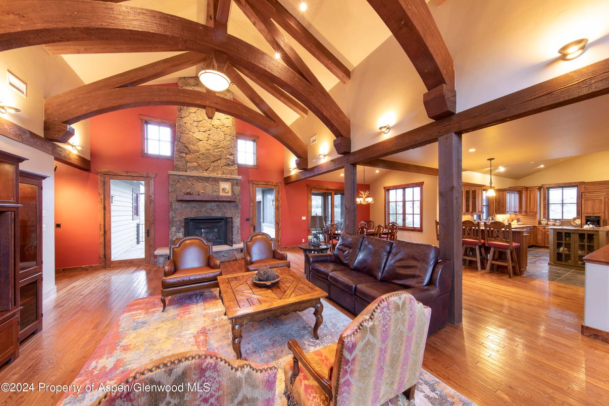 Dining room, Fireplace, Interior, Kitchen, Living room, Pendant Lights, Recessed Lighting, Wooden Beams, Wood Texture Flooring