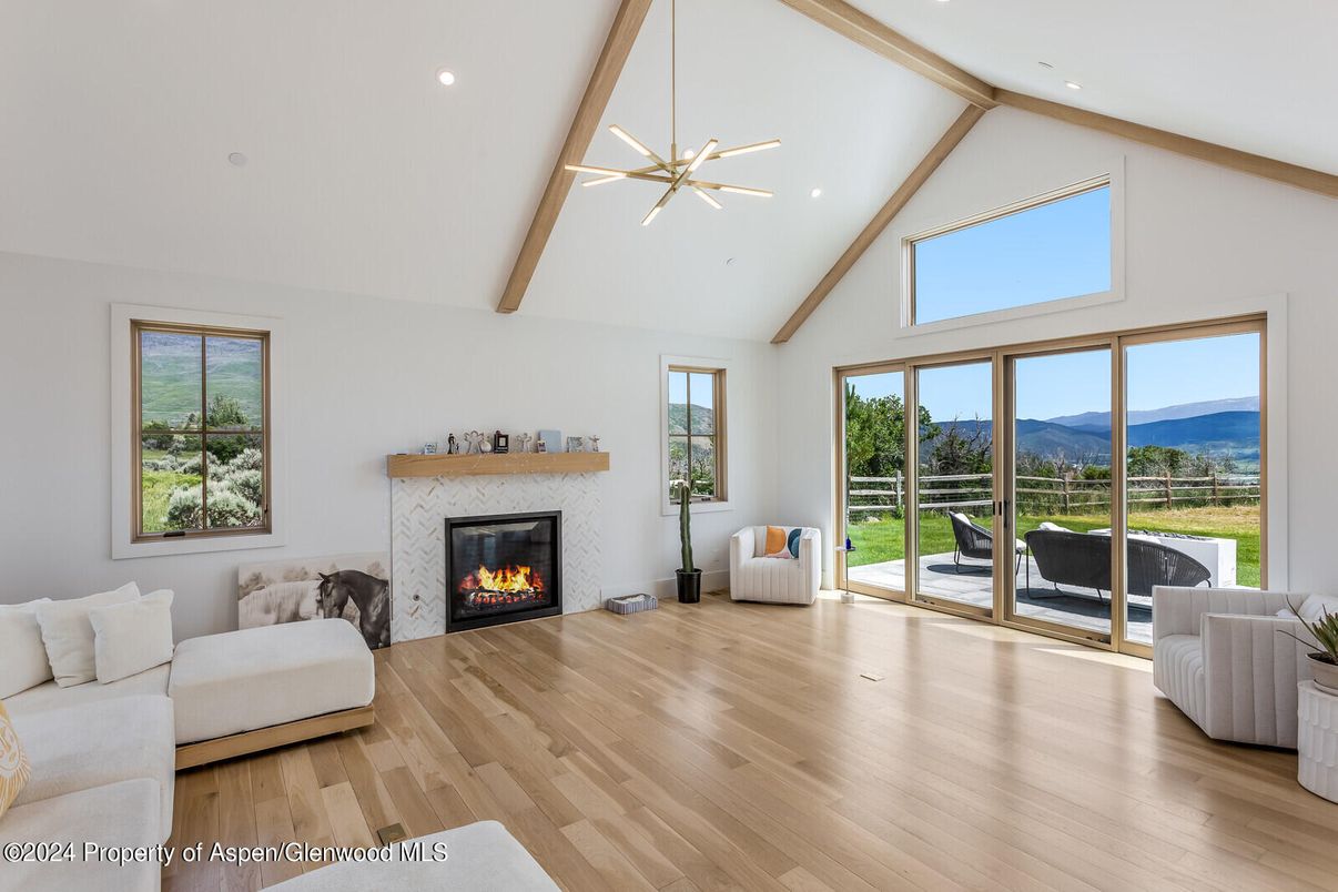 Fireplace, Interior, Living room, Pendant Lights, Recessed Lighting, Wooden Beams, Wood Texture Flooring