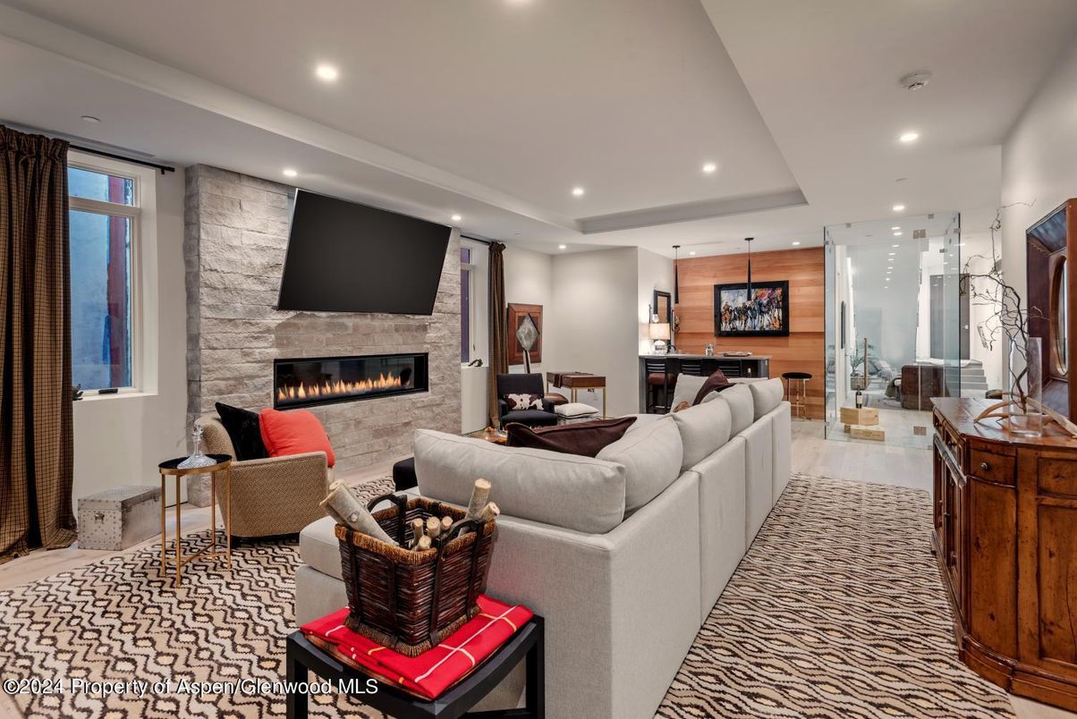 Fireplace, Interior, Living room, Pendant Lights, Recessed Lighting, Stone Walls