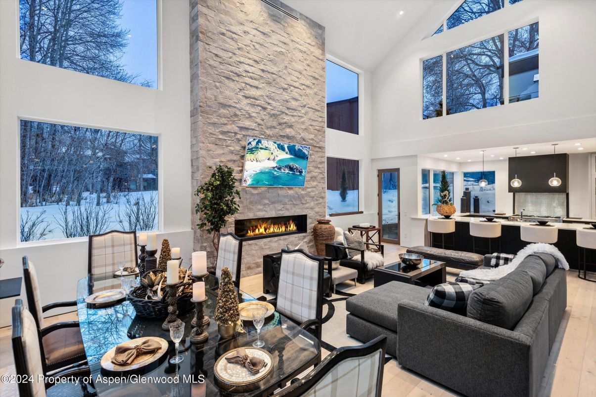 Dining room, Fireplace, Interior, Kitchen, Living room, Pendant Lights, Recessed Lighting, Stone Walls, Wood Texture Flooring