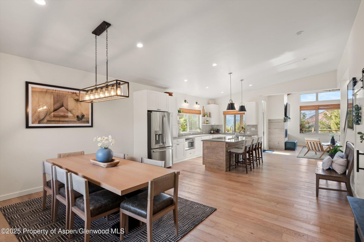 Dining room, Interior, Kitchen, Pendant Lights, Recessed Lighting, Stainless Steel Appliances, Wood Texture Flooring