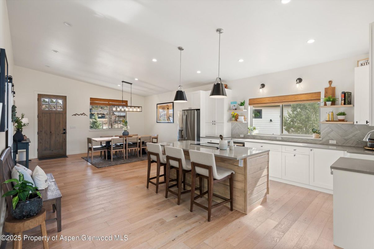 Dining room, Interior, Kitchen, Pendant Lights, Recessed Lighting, Stainless Steel Appliances, Wood Texture Flooring