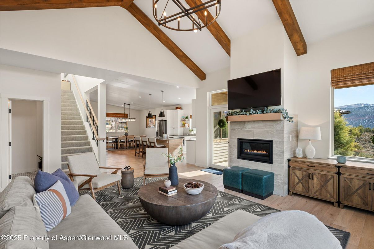Dining room, Fireplace, Interior, Kitchen, Living room, Pendant Lights, Recessed Lighting, Stainless Steel Appliances, Wooden Beams, Wood Texture Flooring