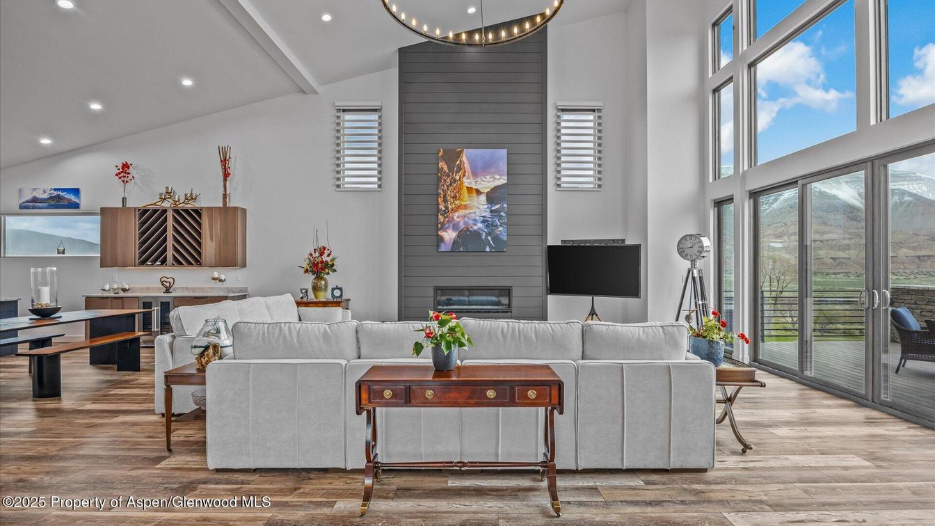 Dining room, Fireplace, Interior, Living room, Pendant Lights, Recessed Lighting, Wood Texture Flooring