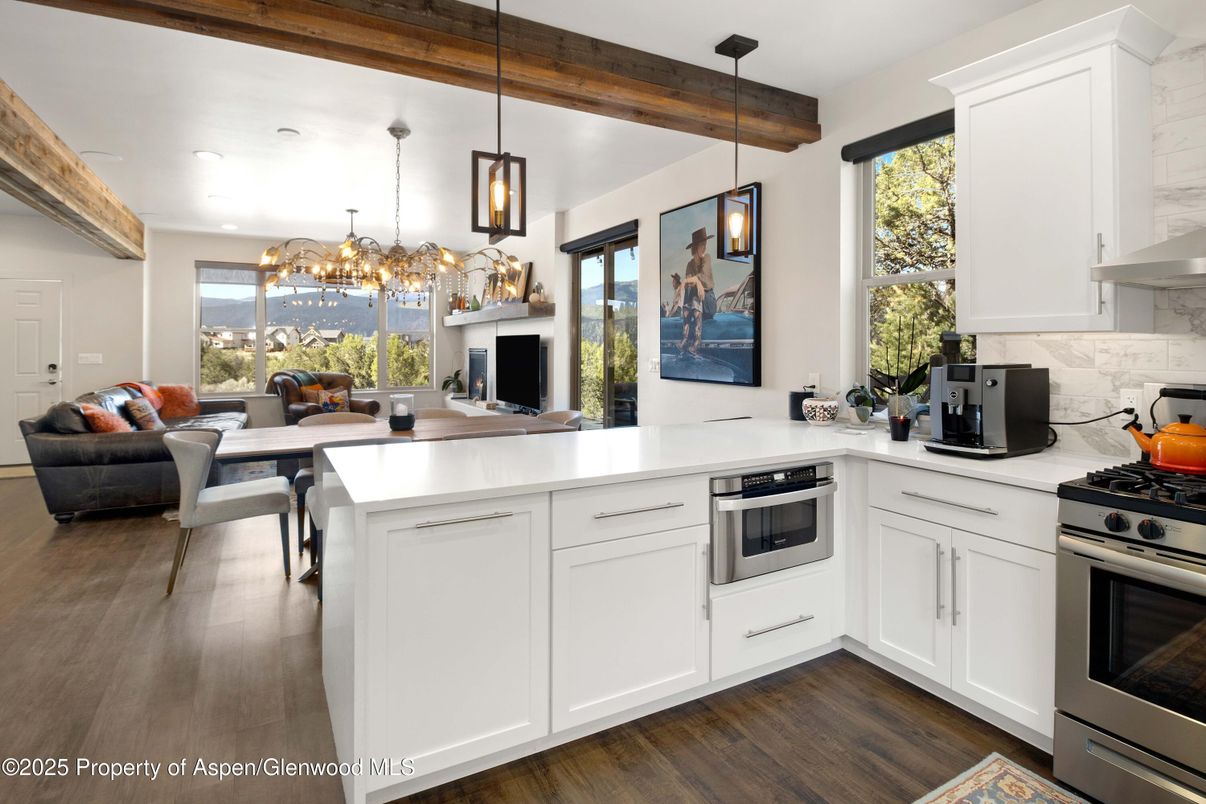 Dining room, Interior, Kitchen, Living room, Pendant Lights, Recessed Lighting, Stainless Steel Appliances, Wood Texture Flooring