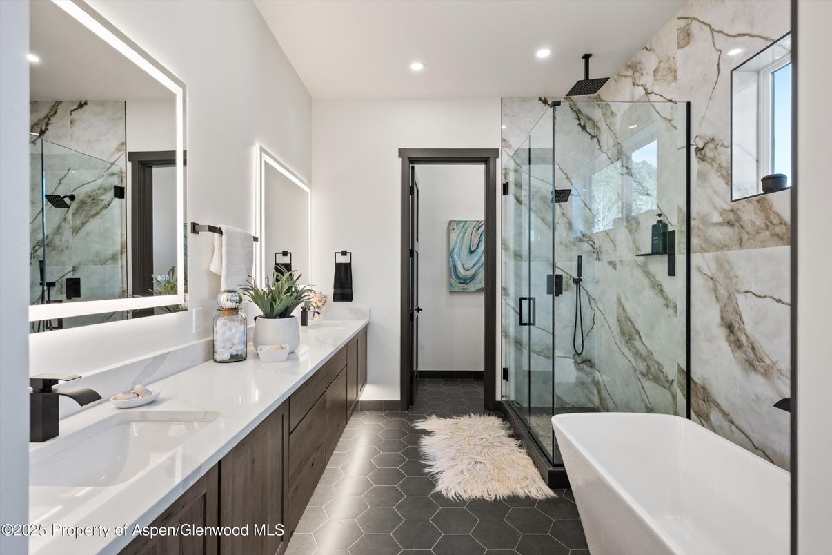 Bathroom, Dual Sink Vanities, Free Standing Baths, Glass Shower, Interior, Marble Walls, Recessed Lighting