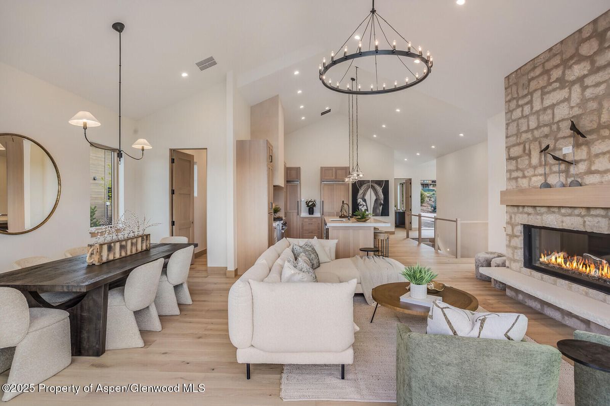 Dining room, Fireplace, Interior, Living room, Pendant Lights, Recessed Lighting, Stone Walls, Wood Texture Flooring