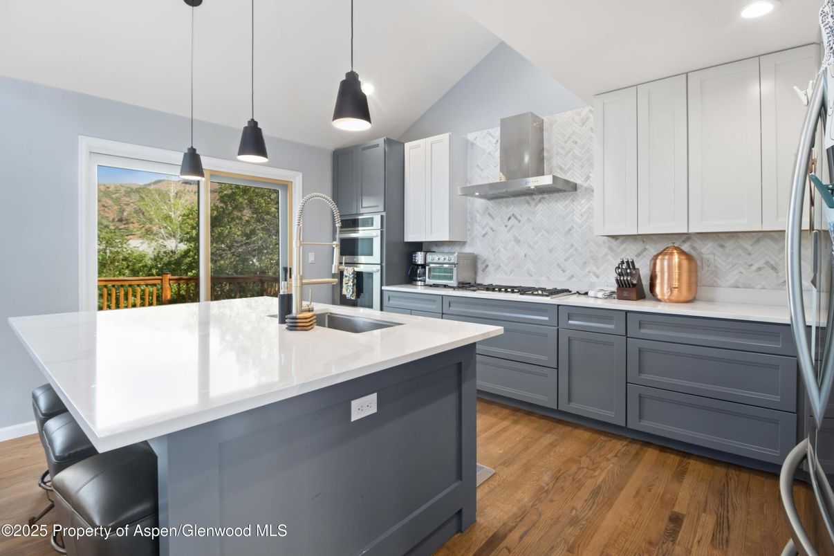 Interior, Kitchen, Pendant Lights, Recessed Lighting, Stainless Steel Appliances, Wood Texture Flooring