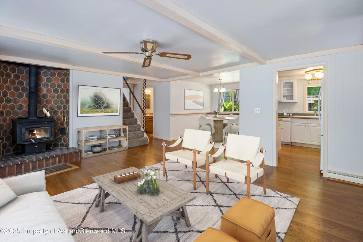 Dining room, Fireplace, Interior, Living room, Pendant Lights, Stone Walls, Wood Texture Flooring