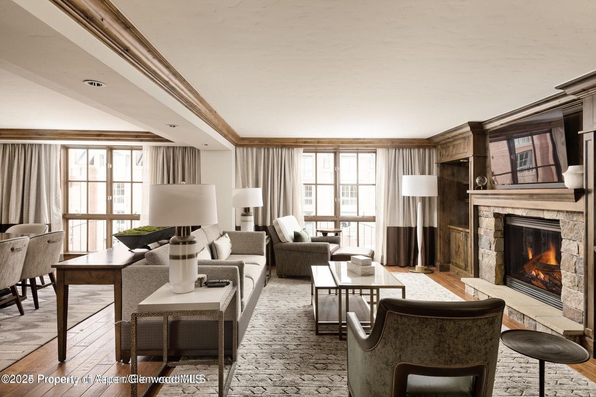 Dining room, Fireplace, Interior, Living room, Recessed Lighting, Wood Texture Flooring