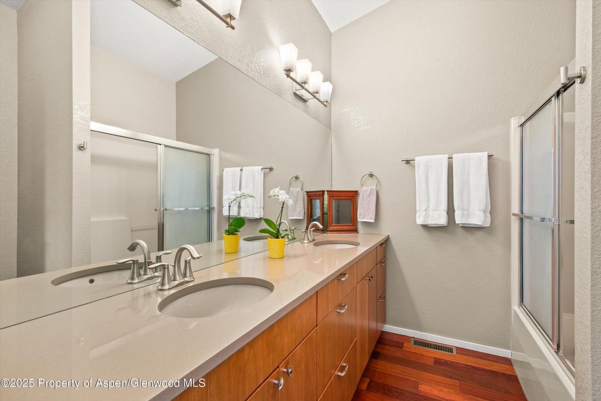 Bathroom, Dual Sink Vanities, Glass Shower, Interior, Wood Texture Flooring