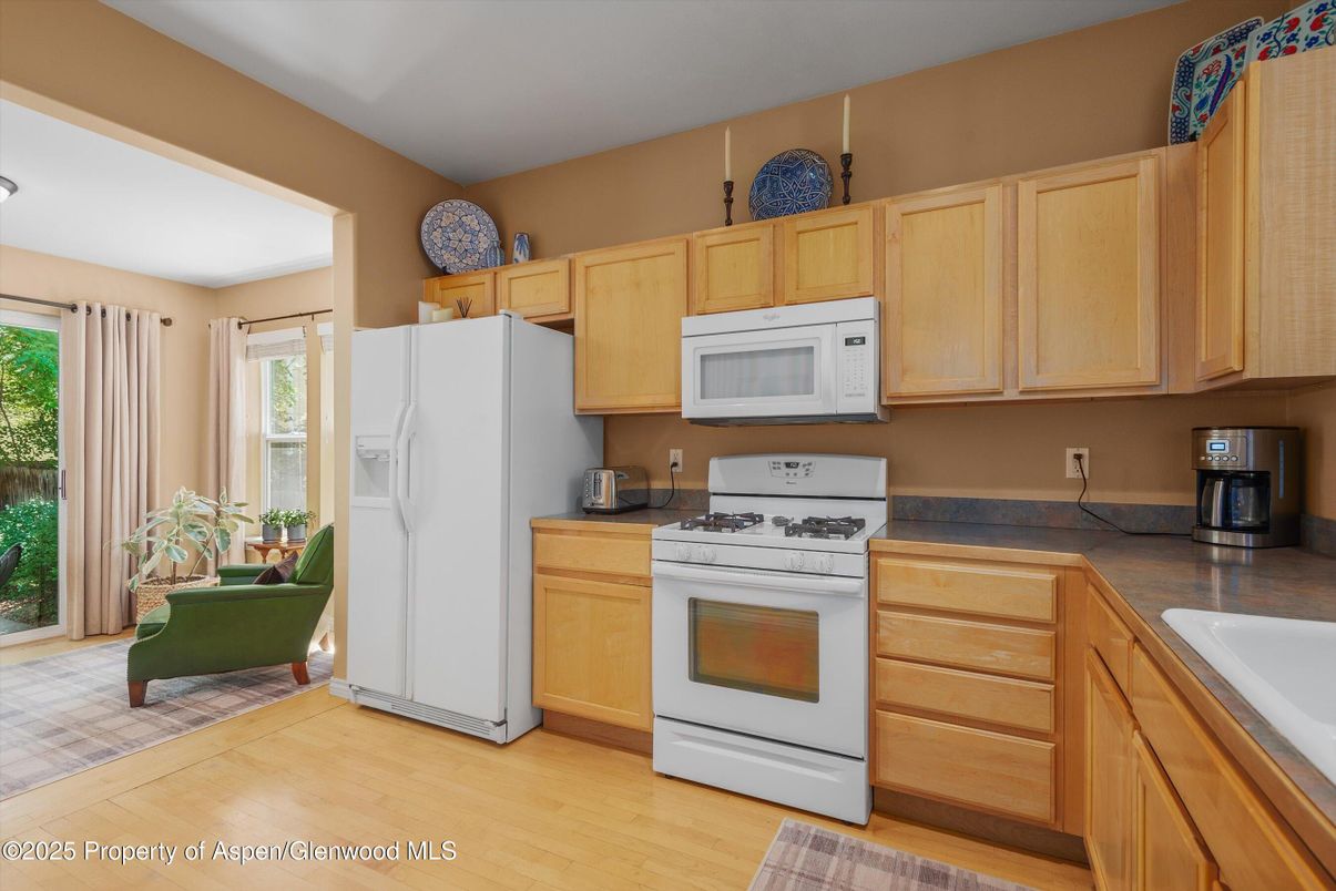 Interior, Kitchen, Tile Countertops, Wood Texture Flooring