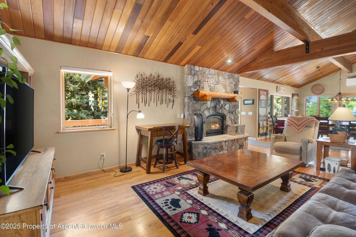 Fireplace, Interior, Living room, Recessed Lighting, Stone Walls, Wooden Beams, Wooden Ceilings, Wood Texture Flooring