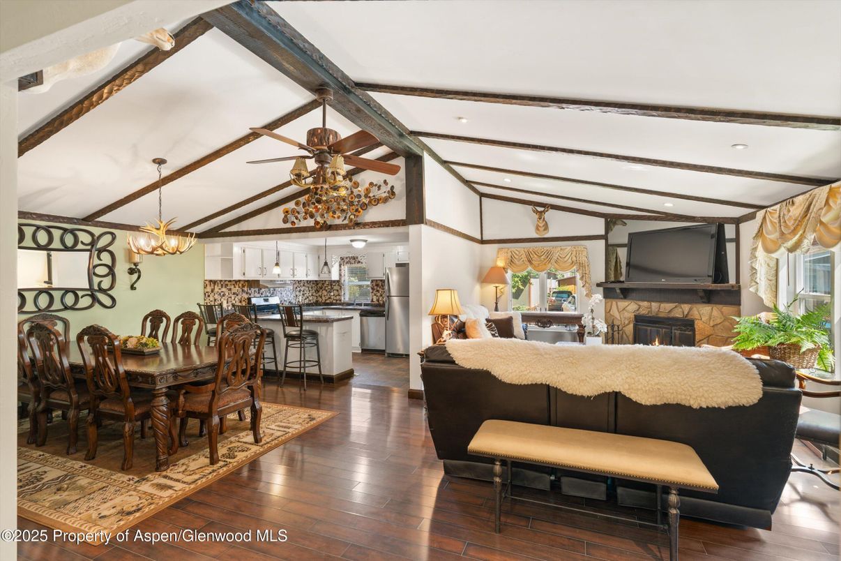 Chandelier, Dining room, Fireplace, Interior, Kitchen, Living room, Pendant Lights, Recessed Lighting, Wood Texture Flooring