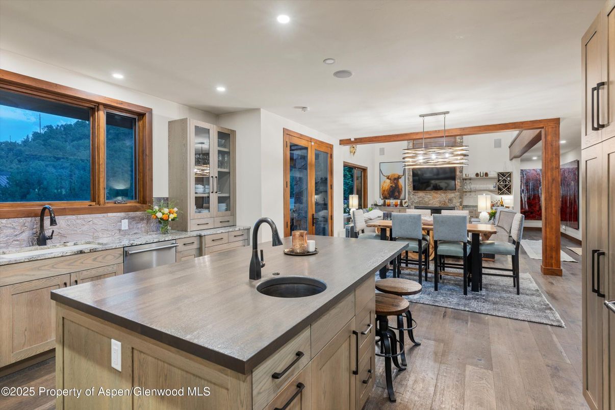 Dining room, Interior, Kitchen, Pendant Lights, Recessed Lighting, Stainless Steel Appliances, Wood Texture Flooring