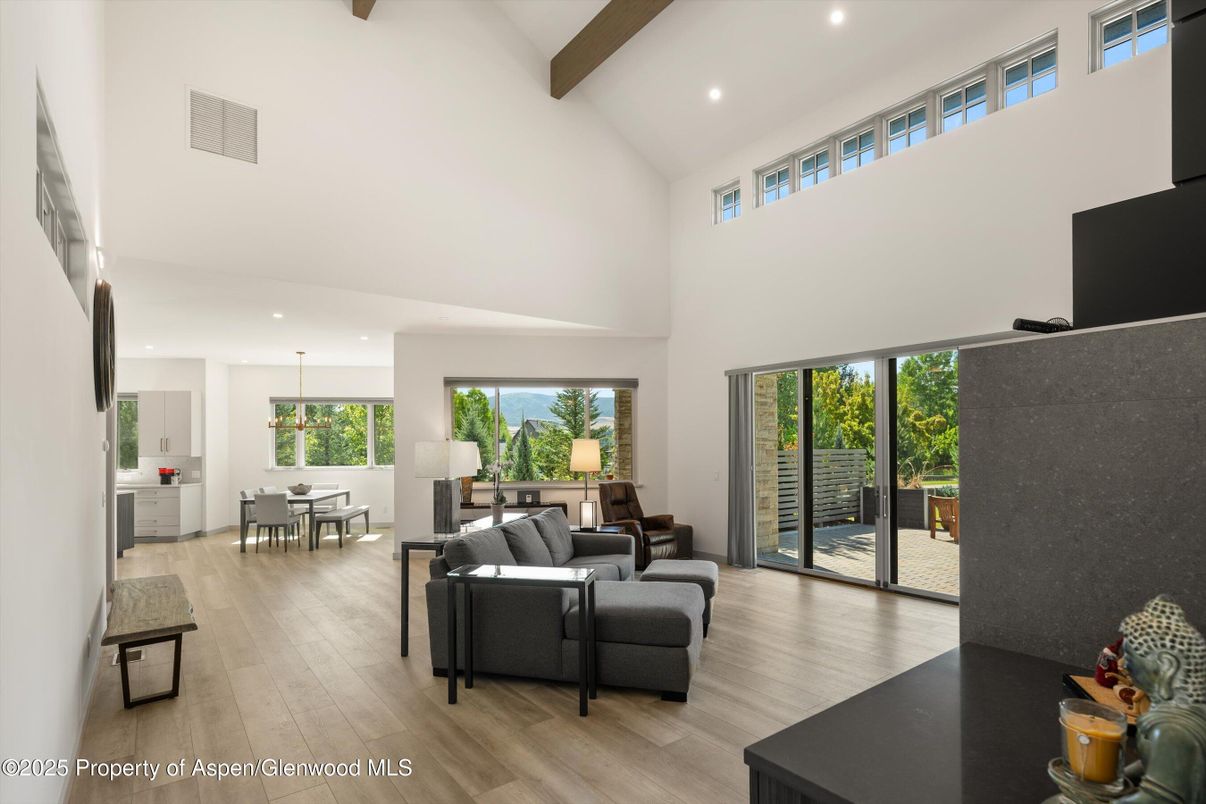 Dining room, Interior, Living room, Pendant Lights, Recessed Lighting, Wooden Beams, Wood Texture Flooring