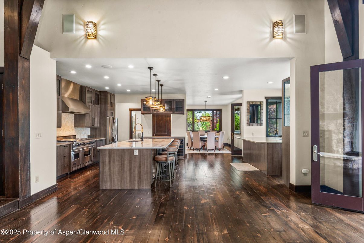Dining room, Interior, Kitchen, Pendant Lights, Recessed Lighting, Stainless Steel Appliances, Wood Texture Flooring