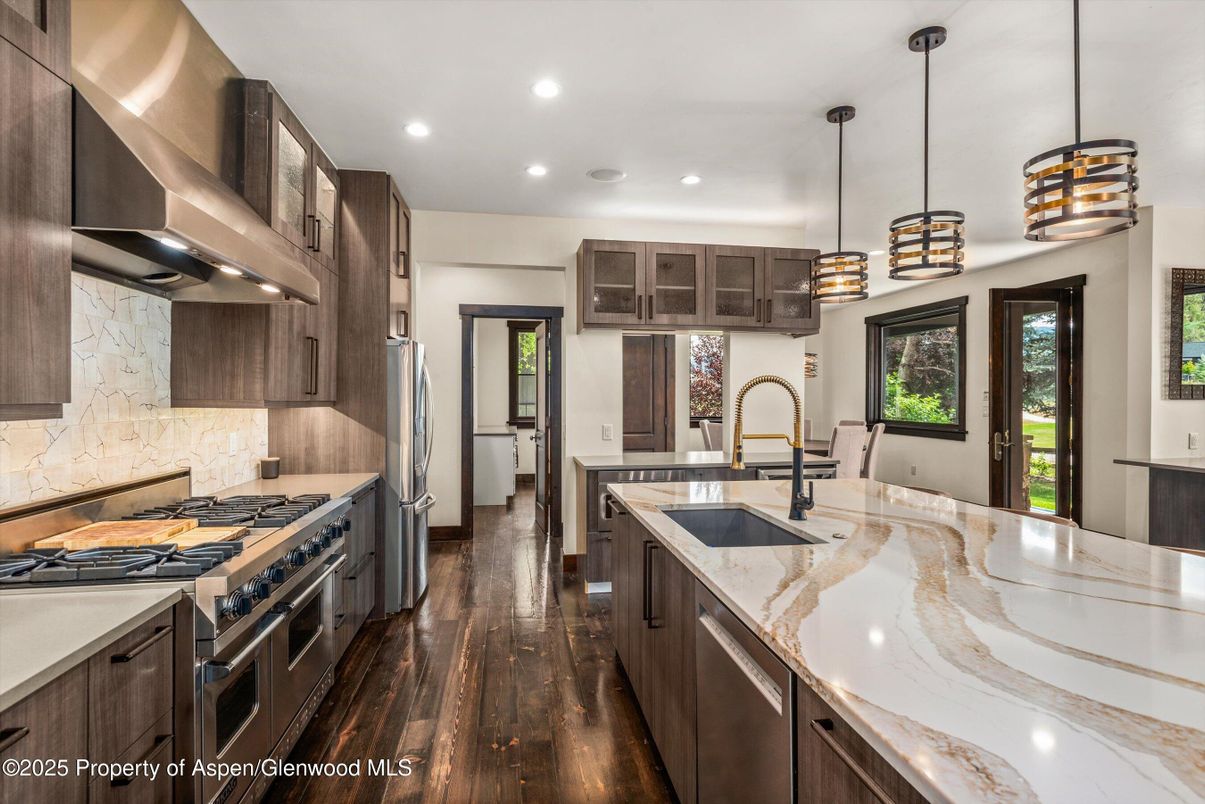 Interior, Kitchen, Pendant Lights, Recessed Lighting, Stainless Steel Appliances, Wood Texture Flooring